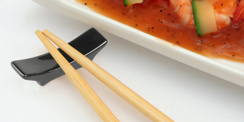 Chopsticks on chopstick rest made of porcelain|default:Chopstick rests|default:.NAME